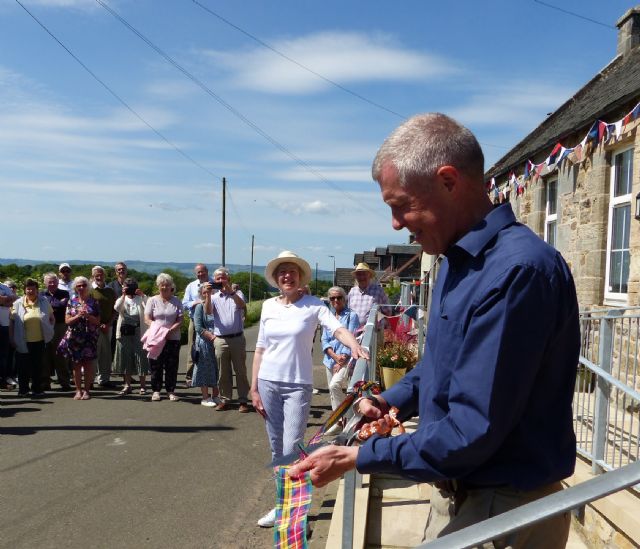 Willie Rennie MSP opens the Hall by cutting the ribbon; BKCT fund-raiser-in-chief Mary Lochhead in white blouse Willie Rennie MSP opens the Hall by cutting the ribbon; BKCT fund-raiser-in-chief Mary Lochhead in white blouse